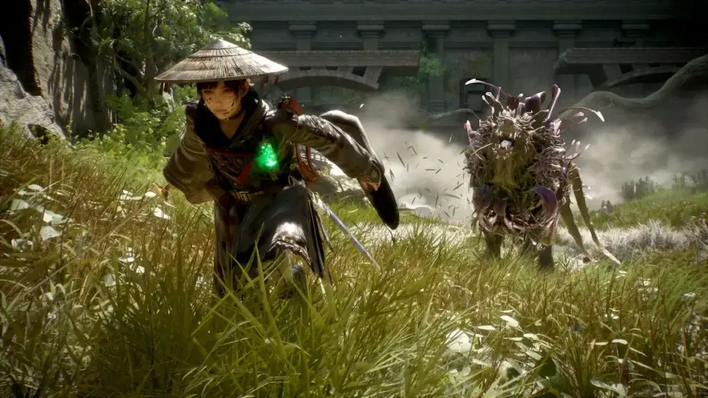 A warrior in traditional Japanese attire and a conical hat facing a monstrous creature in a grassy field