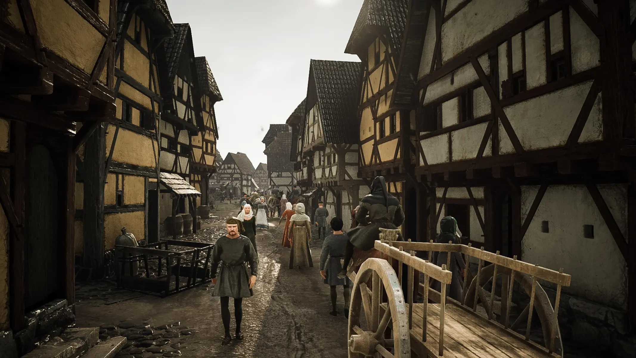 Medieval village street with half-timbered houses, peasants in period clothing, and a wooden cart.