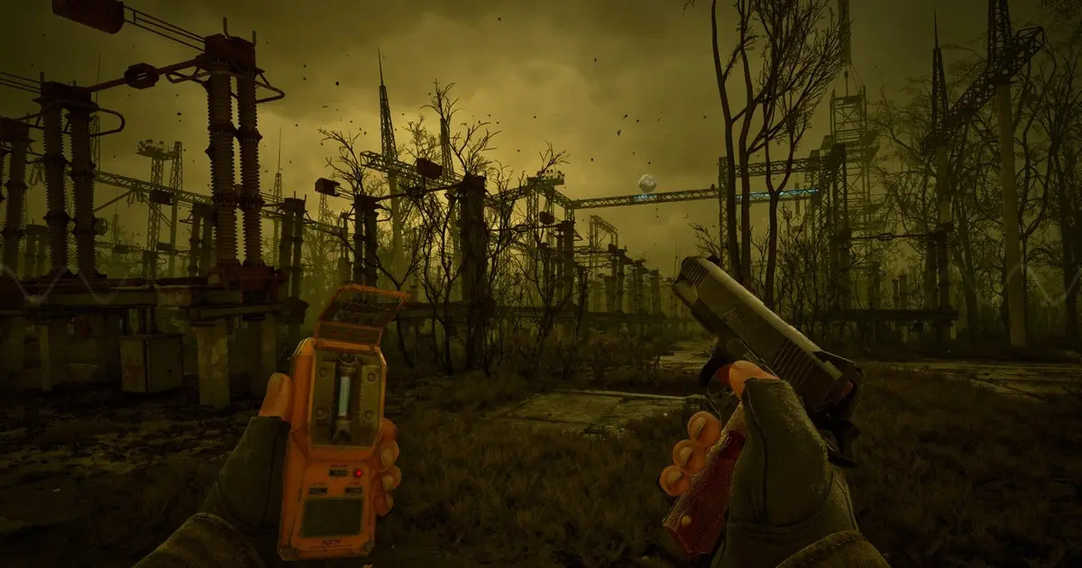 First-person perspective in S.T.A.L.K.E.R. 2 showing a handheld detector and pistol in a foggy industrial wasteland