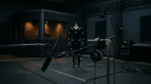 Empty voice recording studio with microphone and motion capture equipment in moody lighting