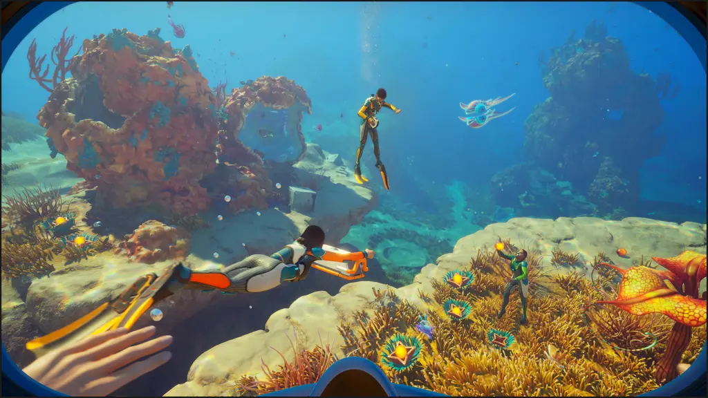 Three divers exploring a colorful underwater alien reef with vibrant corals and marine life in Subnautica 2