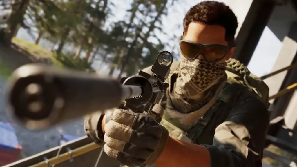 First-person perspective of a masked soldier aiming a suppressed rifle in Wardogs
