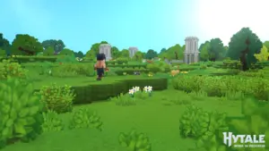 Zrzut ekranu z gry Hytale przedstawiający postać w zielonym, zablokowanym krajobrazie z ruinami.