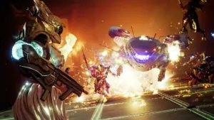 Zrzut ekranu z gry Destiny 2 przedstawiający walkę postaci z dużym, mechanicznym przeciwnikiem w otoczeniu wybuchów.