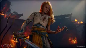 Kobieta z gry God of War: Laufey trzymająca miecz na tle płonących ruin.