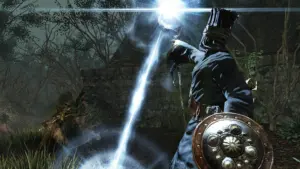 Kadr z gry Dark Souls II przedstawiający postać gracza walczącą z przeciwnikami przy użyciu magii.