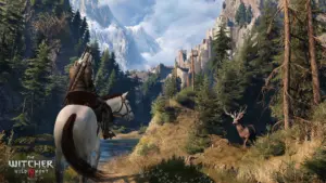 Geralt z Rivii na koniu w krajobrazie z gry The Witcher 3: Dziki Gon z zamkiem i jeleniem w tle